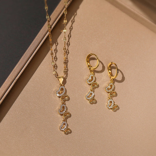 Set Collana e Orecchini a Pendente Farfalla Insetto Geometrico Minimalista in Rame con Intarsio di Zirconi per Donne