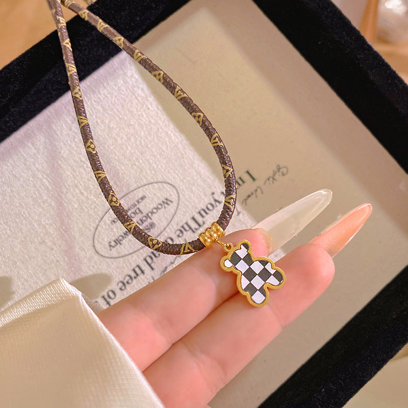 Casual Elegant Gold Plated Checkered Animal Titanium Steel Necklace