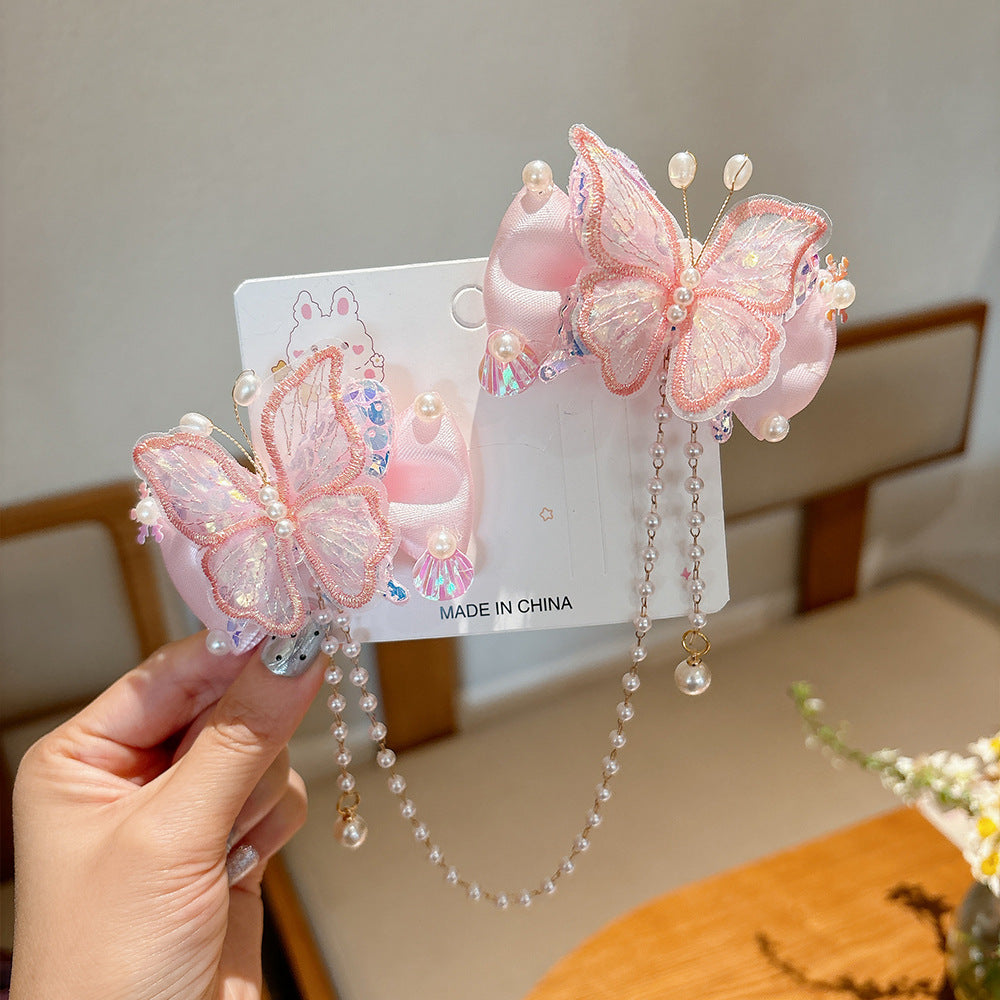 Lindos clips de pelo con diseño de mariposa estilo princesa para niñas con detalles de perlas y borlas, diseño de lazo de tela, set de pinzas laterales hecho a mano para niñas