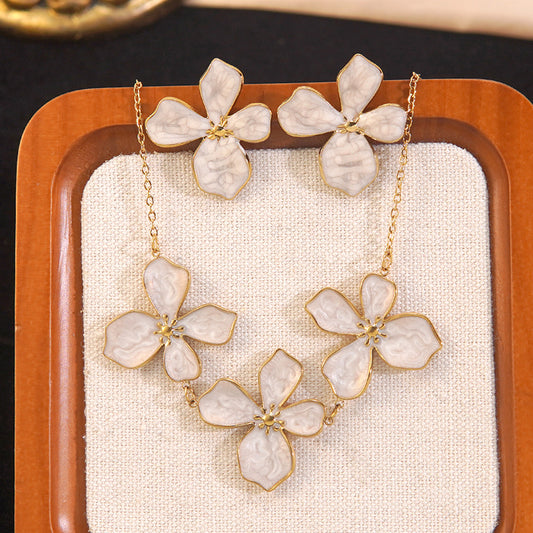 Juego de collar y aretes de acero inoxidable con diseño floral de goteo de aceite minimalista y elegante para mujer