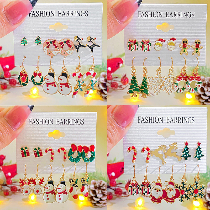 Set de pendientes de aleación con motivos navideños de muñeco de nieve, copo de nieve, reno y árbol de Navidad para mujer