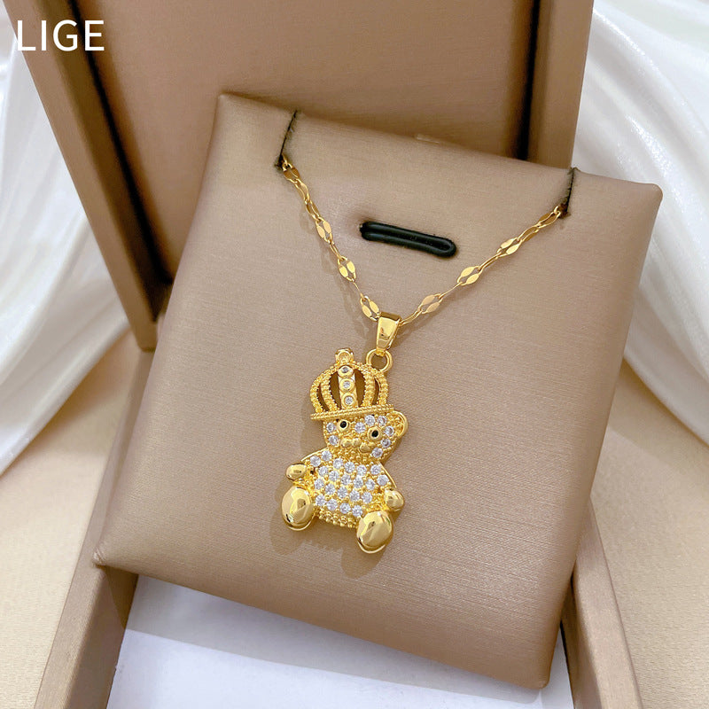 Collar con colgante de oso minimalista con diseño de corona de circonitas en acero de titanio para mujer y hombre