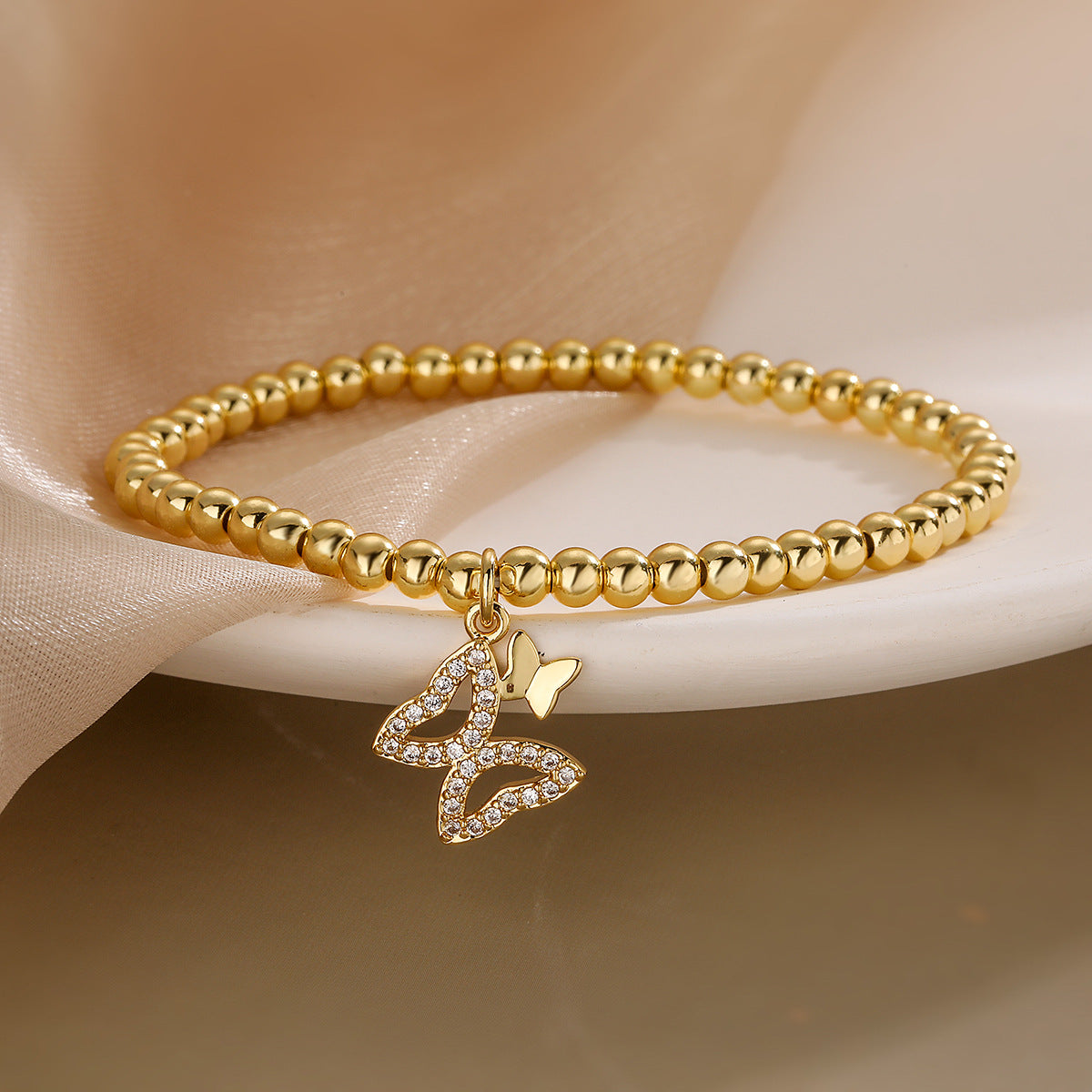 Elegant French-Style Copper Bracelet with Gold Plating, Zircon Inlay, Butterfly and Geometric Design, Women's Fashion Accessory