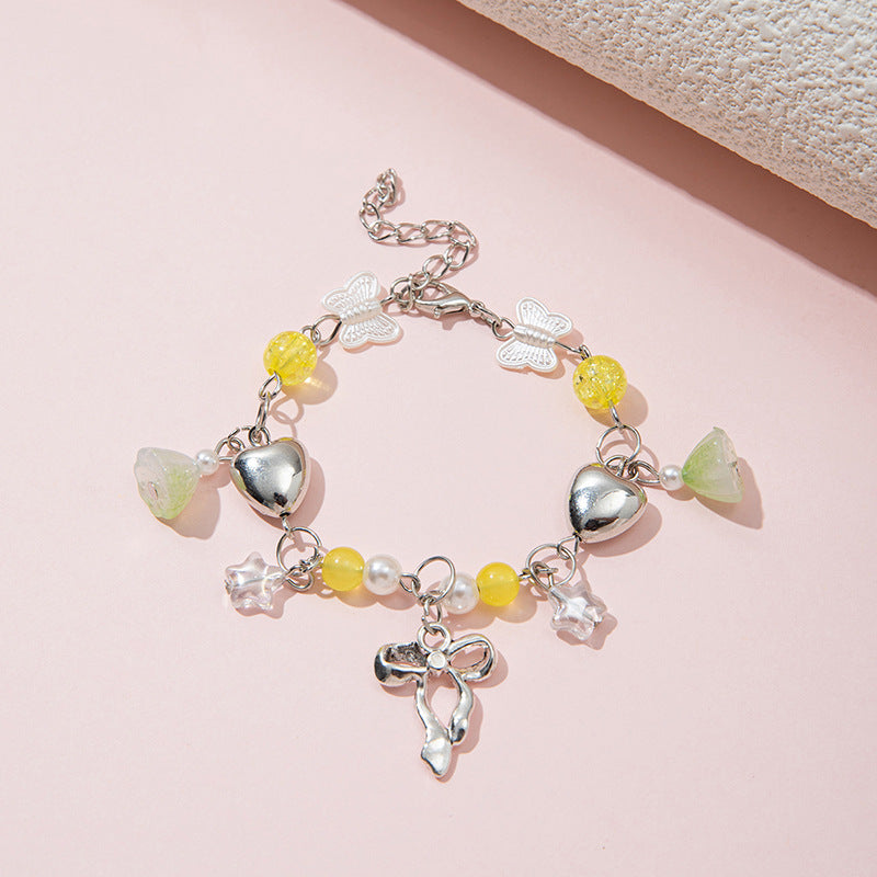 Braccialetto con fiocco e perline di cristallo fatto a mano per ragazze in stile principessa con materiale in resina e design a forma di stella