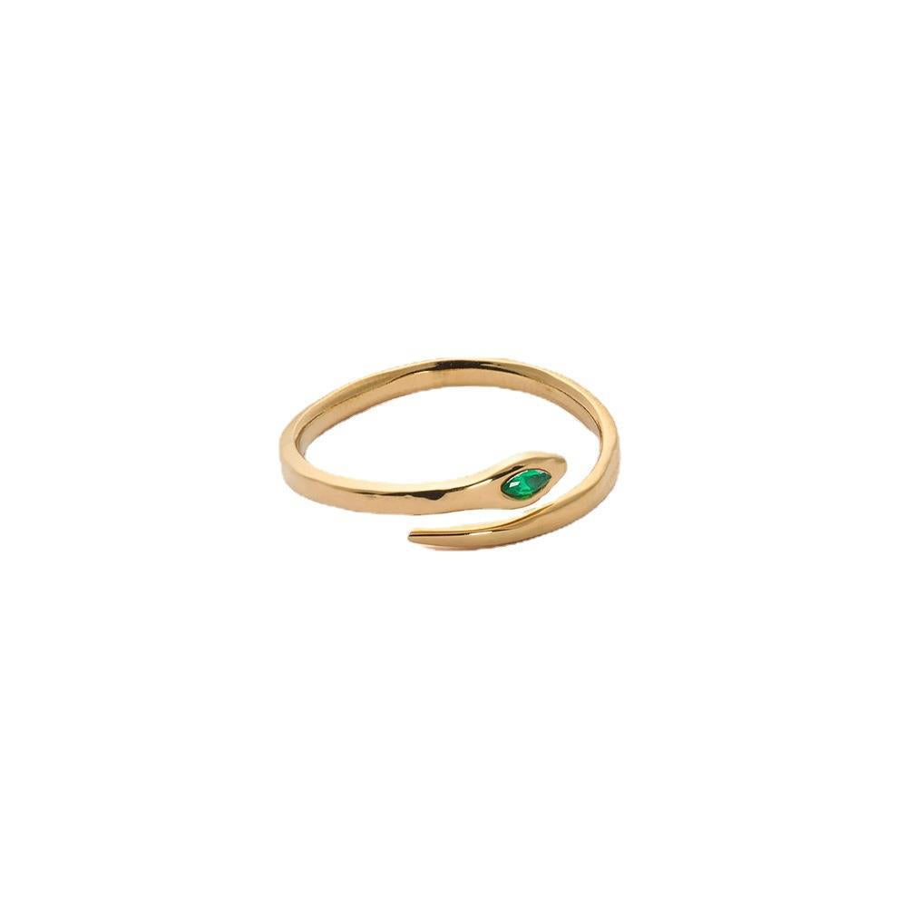 Anello da donna minimalista di lusso a forma di serpente in acciaio inossidabile con intarsio di zirconi e finitura placcata in oro