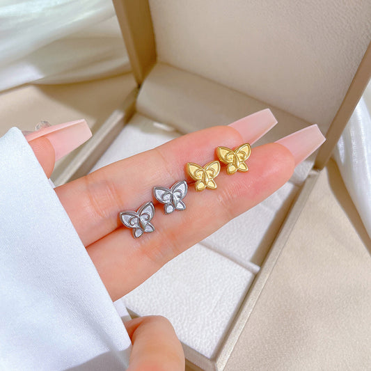 Orecchini in acciaio al titanio con farfalla minimalista vintage placcati, dal design geometrico e un'estetica naturale e cosmica, da donna