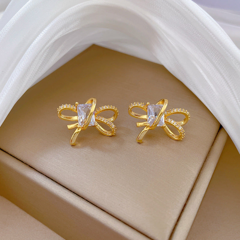 Set collana e orecchini minimalisti con fiocco in acciaio al titanio placcato per donna