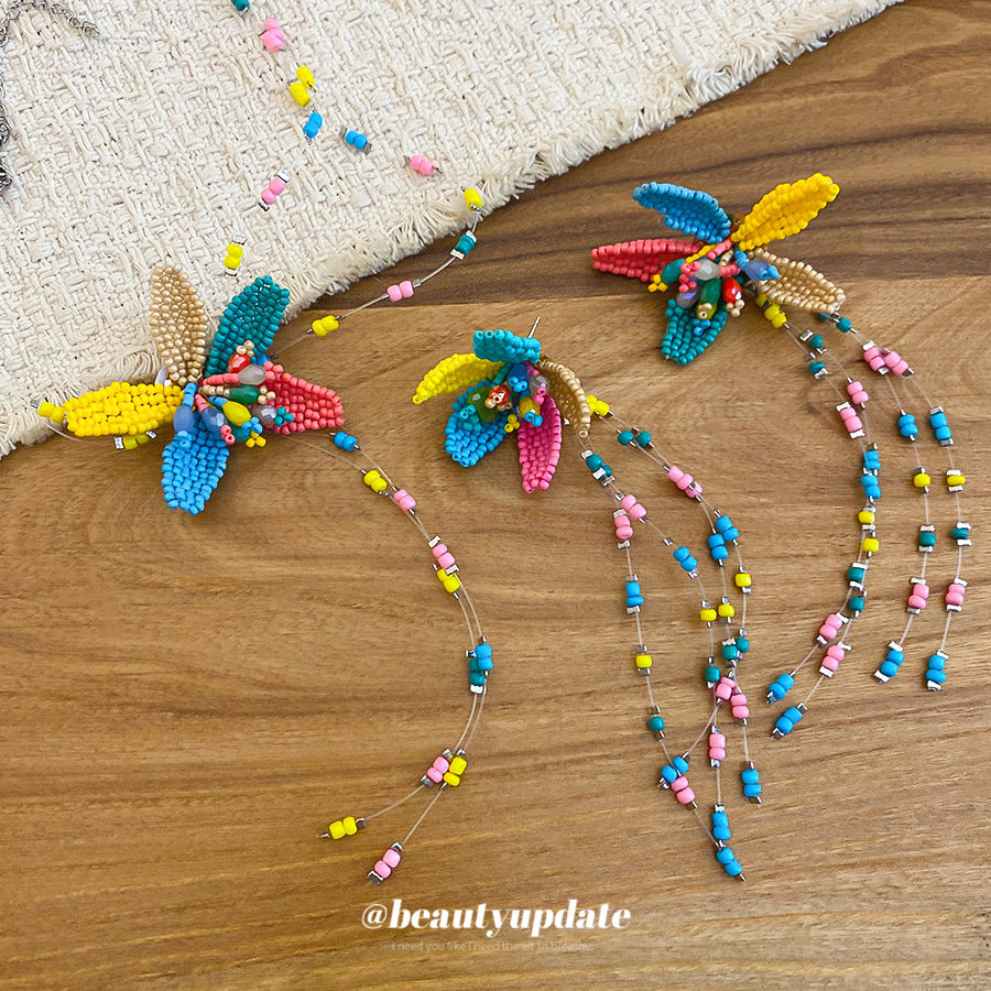 Orecchini pendenti con nappe di cristallo floreali dolci e set di collana con ciondolo a clavicola per donna