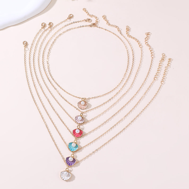 Dulce Collar con Colgante de Mariposa y Lazo Fresco para Niñas con Dije de Concha con Perlas de Aleación y Acabado Esmaltado Artesanal