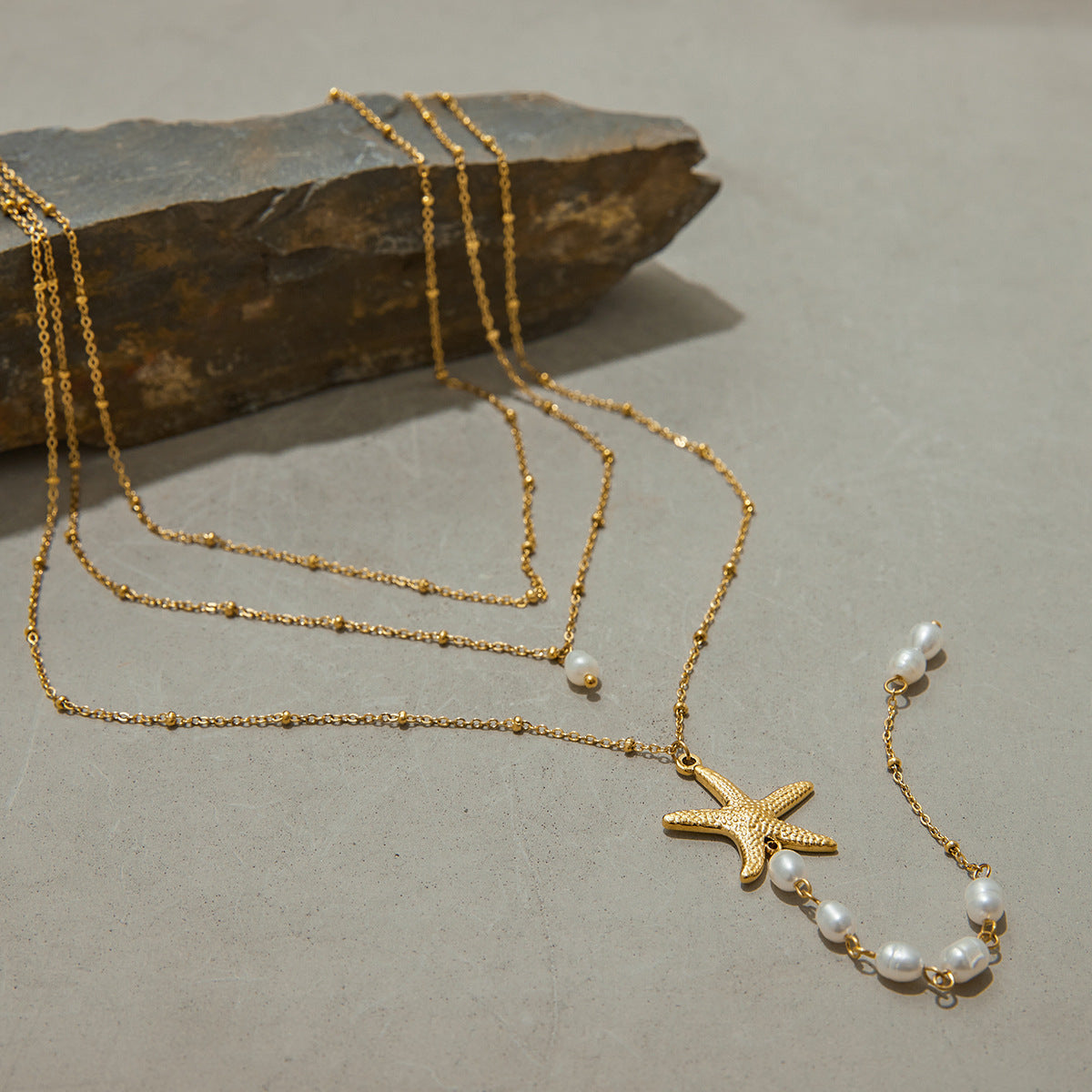 Elegant Stainless Steel Starfish Pendant Necklace with Pearl Inlay for Women