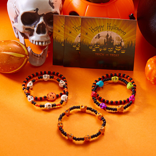 Juego de pulseras elásticas de resina geométrica informal con dijes de calavera para mujer