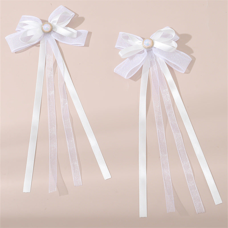 Set di fermagli per capelli in tessuto a forma di fiocco con nastri lunghi e fluenti per bambini, accessori per capelli minimalisti fatti a mano
