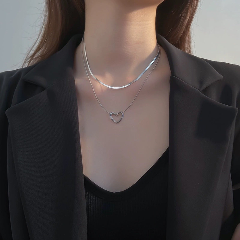 Minimalist Hollow Heart Pendant Necklace in Titanium Steel with Polished Finish for Layering, Snake Chain Style, Unisex Neck Jewelry