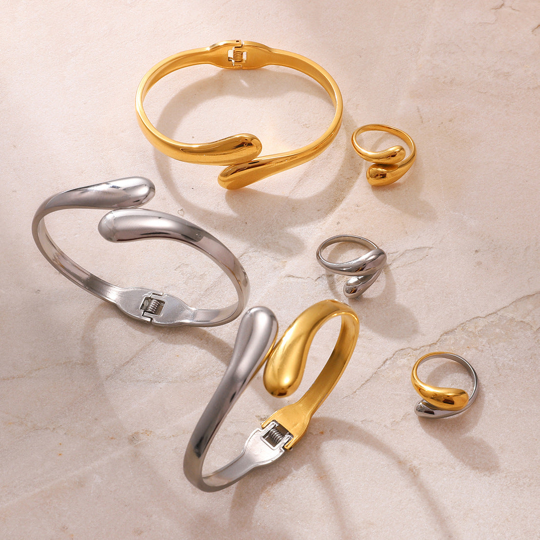 Conjunto de Pulsera de Acero Inoxidable a la Moda con Anillo de Acero de Titanio y Pendientes en Forma de Gota para Mujer