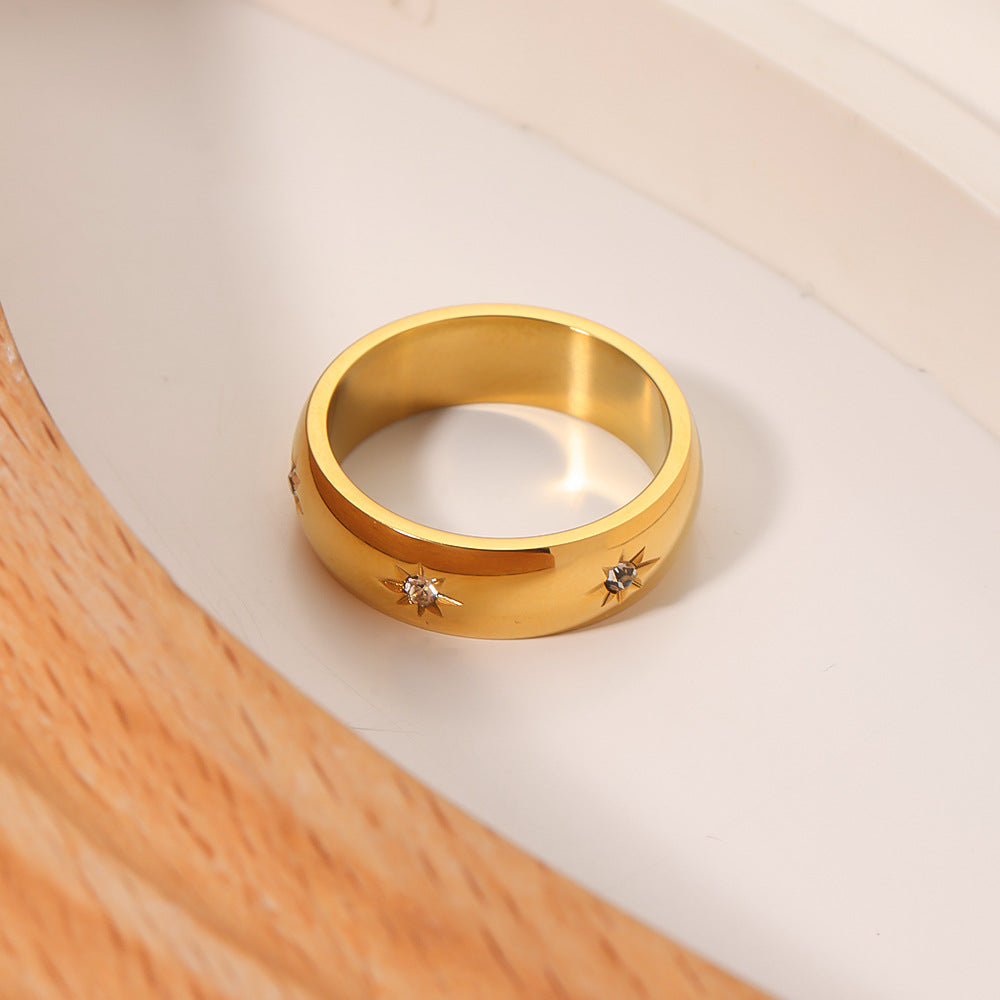 Anello da donna minimalista in acciaio al titanio con stella a otto punte e intarsi di strass