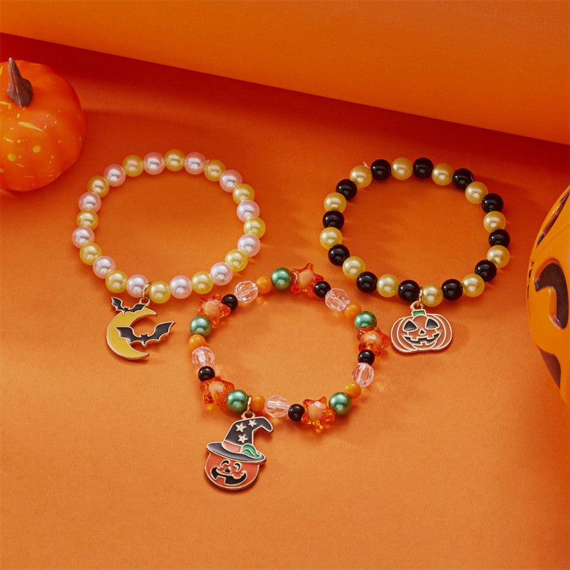 Braccialetto elasticizzato con perline casual geometriche a fantasma e zucca per donna con ciondolo in plastica