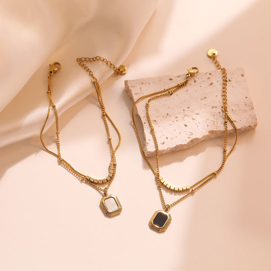 Bracciale da donna impilabile a doppio strato in acciaio al titanio con geometria minimalista e finitura placcata