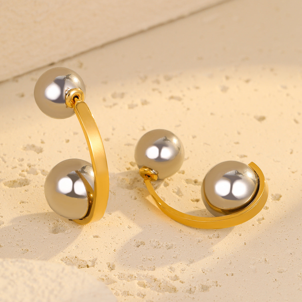 Retro Style Color-Block Hollow Spherical Stainless Steel Earrings for Women with Plated Finish