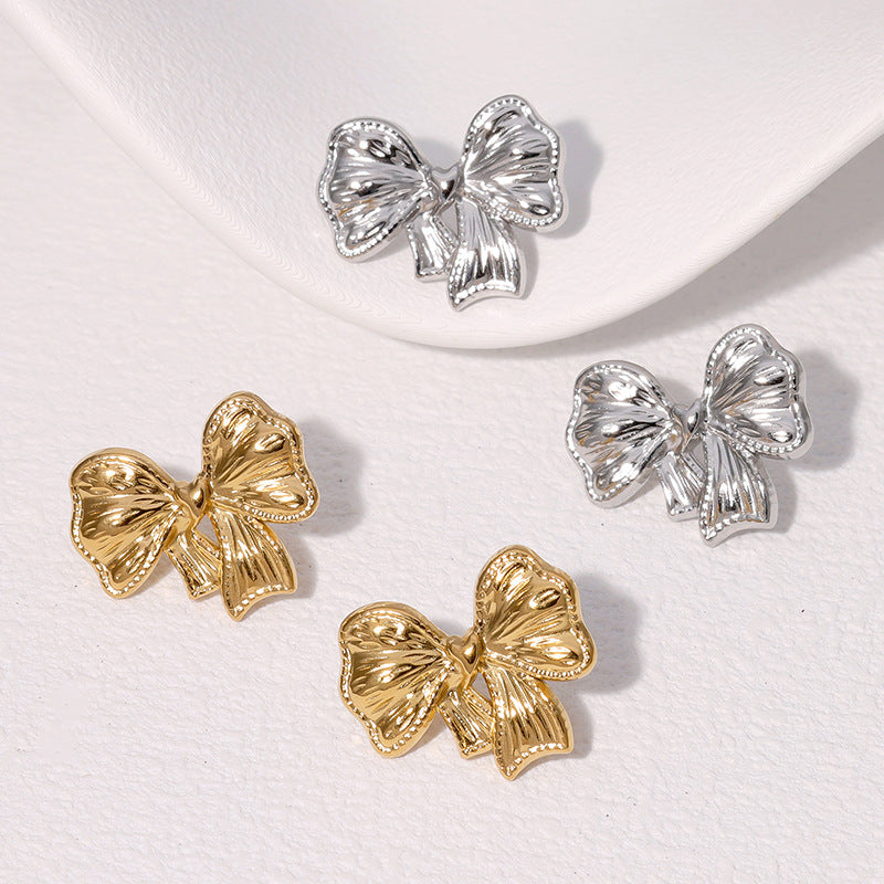 Pendientes minimalistas de acero inoxidable con forma de lazo y acabado chapado para mujer