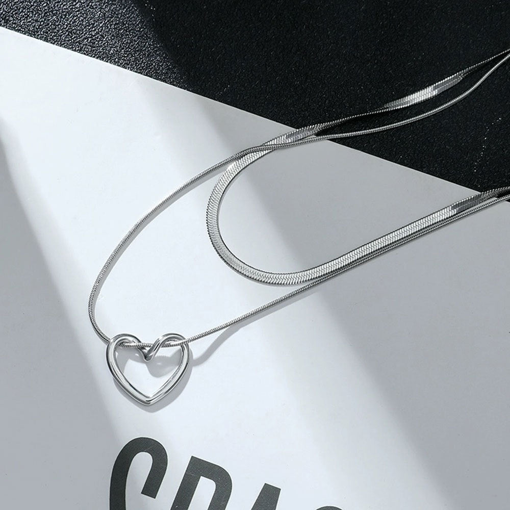 Minimalist Hollow Heart Pendant Necklace in Titanium Steel with Polished Finish for Layering, Snake Chain Style, Unisex Neck Jewelry