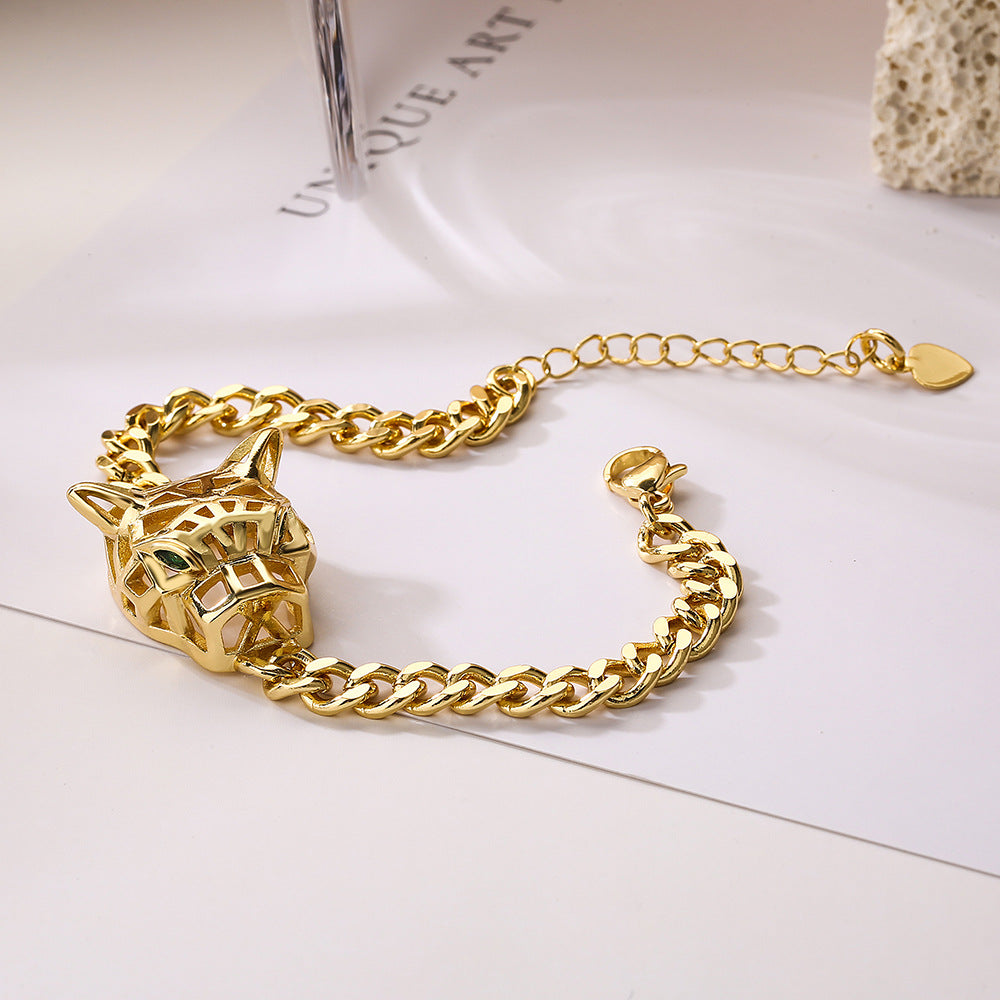 Elegante bracciale a catena cubana con ciondolo a leopardo da donna, realizzato in ottone con placcatura in oro e incastonatura micro-pavé