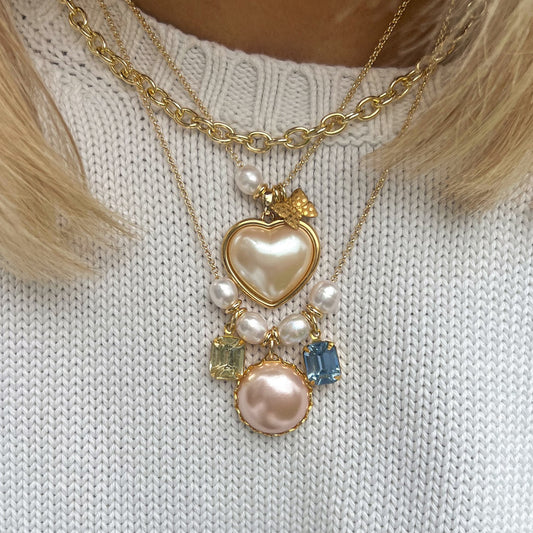 Collana con ciondolo a cuore geometrico in acciaio al titanio con catena in acciaio inossidabile galvanizzato da donna