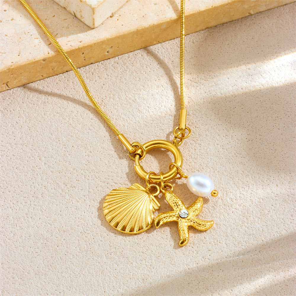 Collana da donna con ciondolo a stella marina e conchiglia, placcata oro su catena snake, in acciaio inossidabile, a tema oceanico