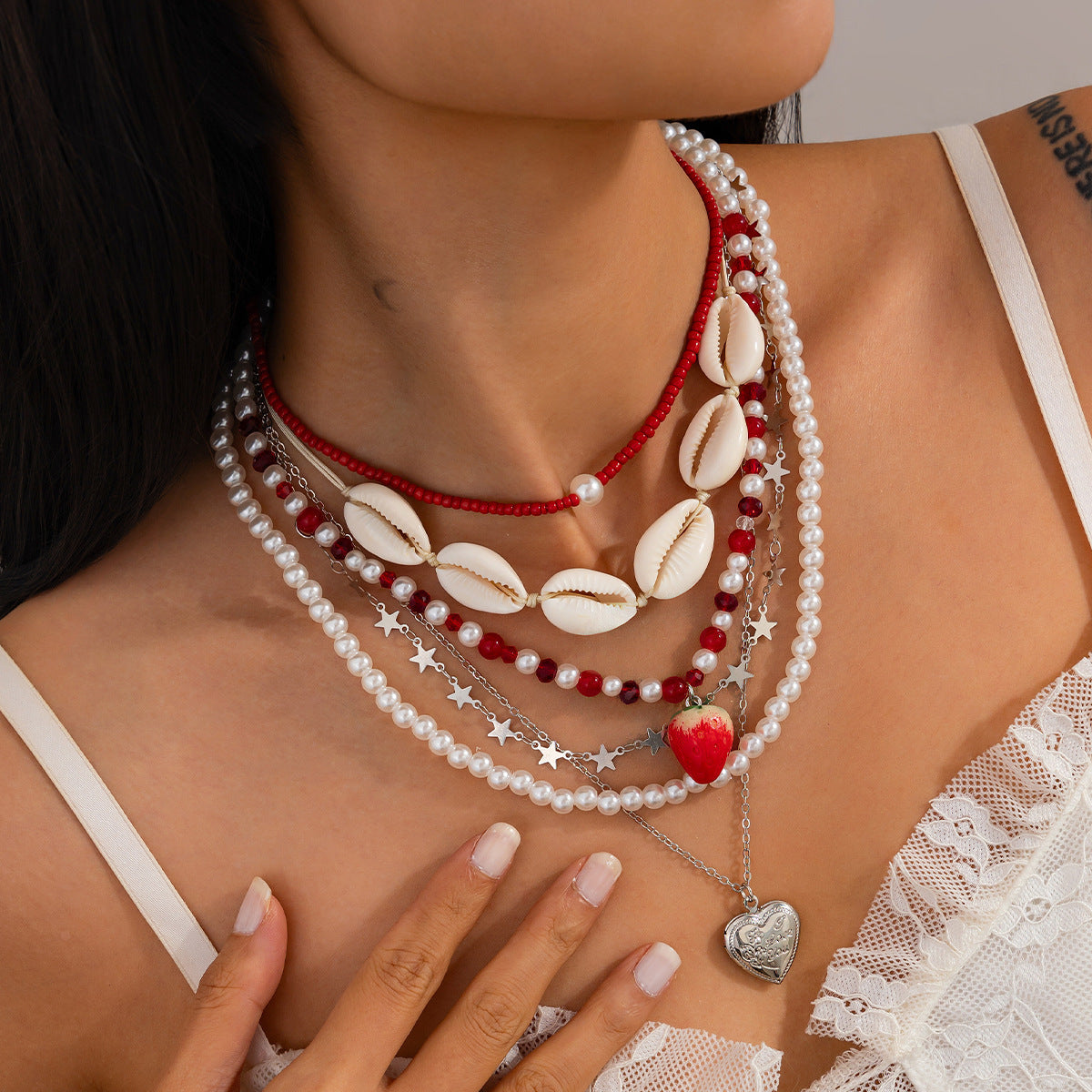 Set di collana da donna con conchiglie e perle a tema boho da spiaggia con ciondolo a cuore