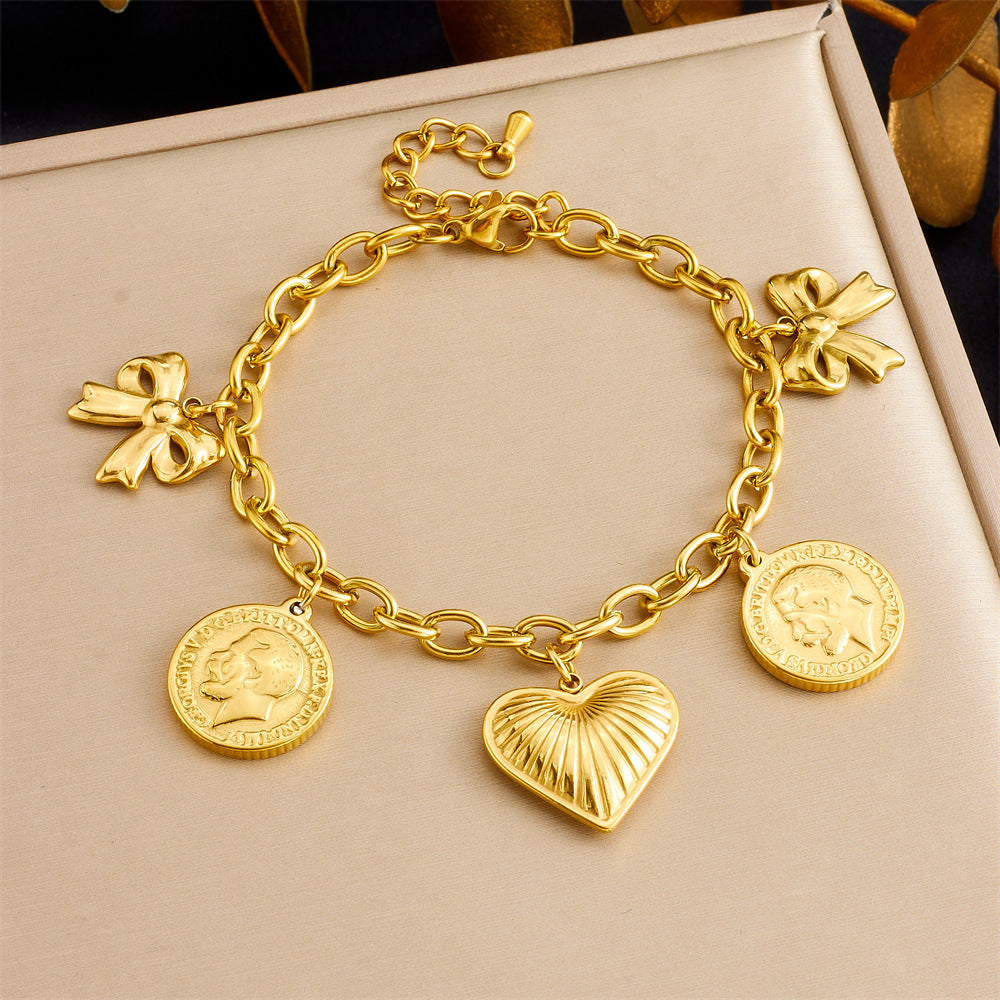 Bracciale con ciondolo floreale e a cuore in stile vintage in acciaio inossidabile con finitura placcata da donna