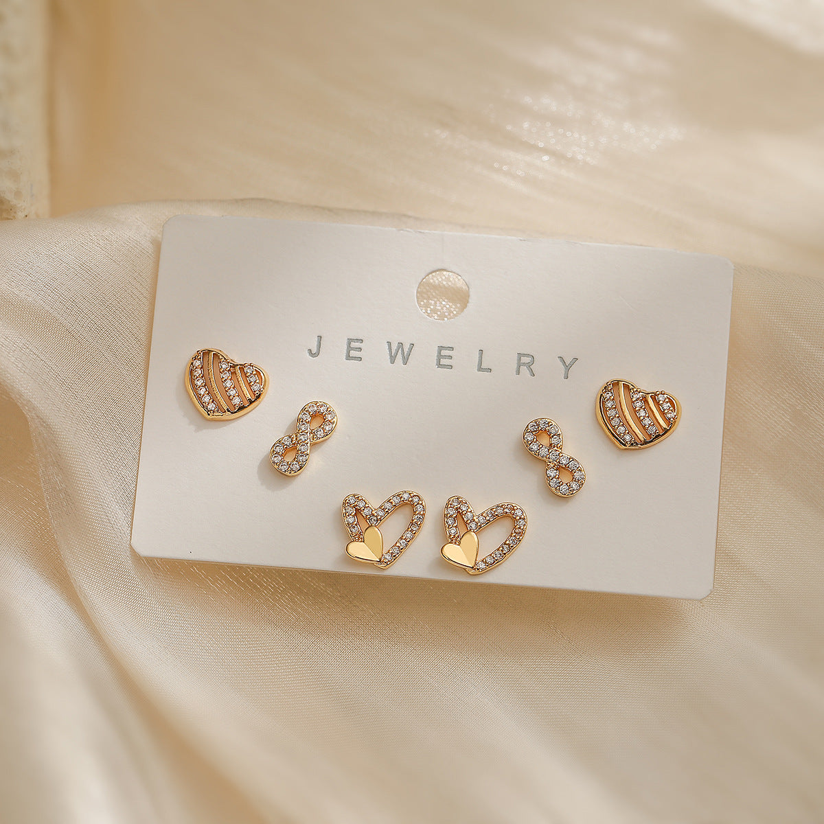 Orecchini da donna geometrici placcati oro 18 carati su base in rame con intarsio di zirconi