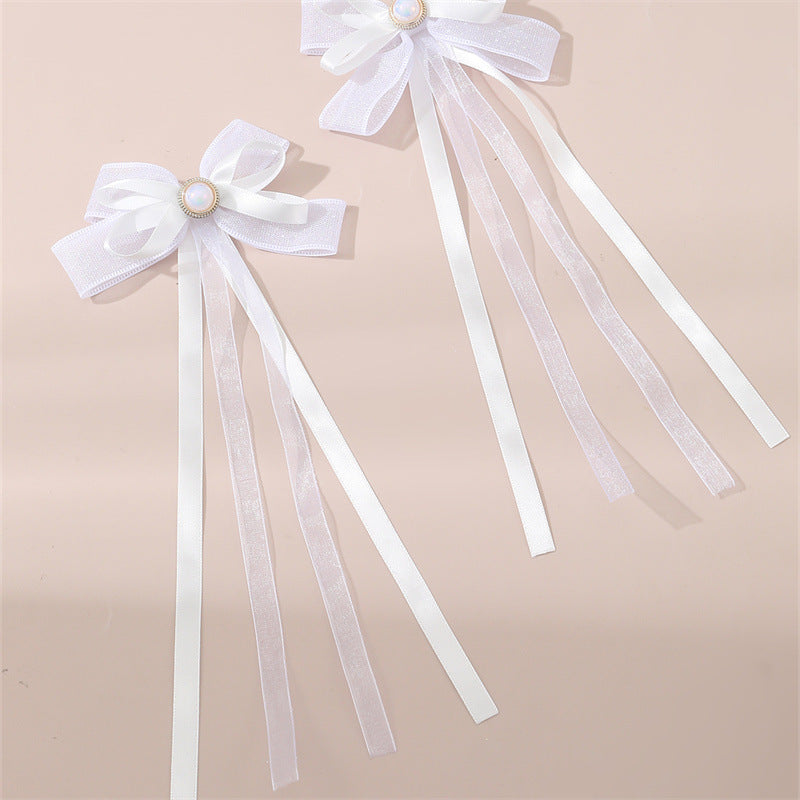 Set di fermagli per capelli in tessuto a forma di fiocco con nastri lunghi e fluenti per bambini, accessori per capelli minimalisti fatti a mano