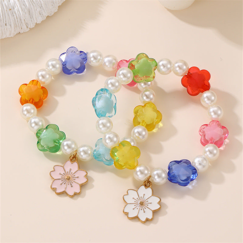 Bracciale per Bambine con Ciondolo a Cuore Floreale e Arcobaleno in Resina Plastica con Perline e Stella