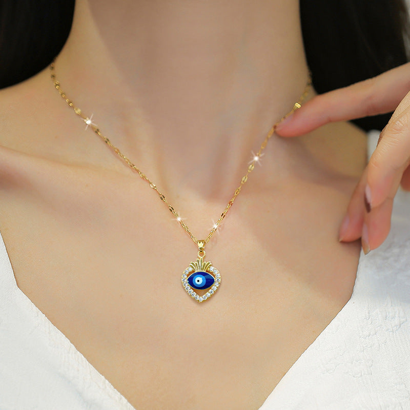 Collana con ciondolo in acciaio al titanio di lusso con motivo geometrico a occhio di Allah e strass, a forma di luna, unisex