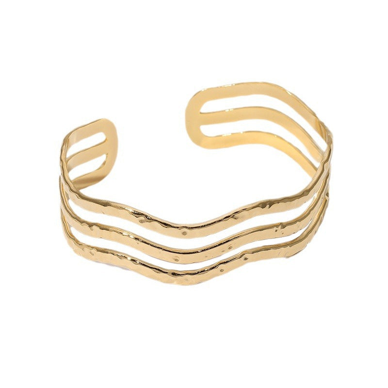 Pulsera Minimalista de Acero Inoxidable Ondulada con Baño de Oro de 18K para Mujer