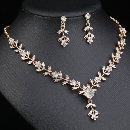 Elegante conjunto de collar y pendientes de lujo con diseño floral para mujer, con colgante de aleación, incrustaciones de pedrería, acabado chapado y cadena tipo O