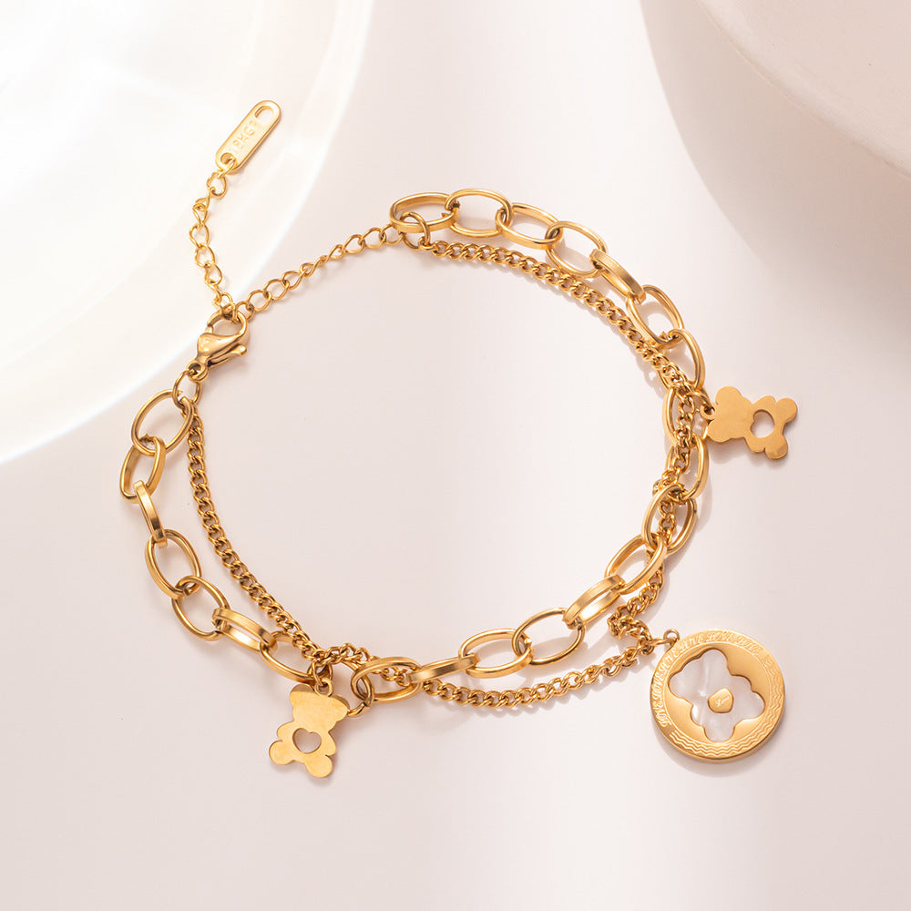 Bracciale a doppio strato in acciaio al titanio placcato oro rosa con ciondoli a cuore e orsetto, gioielli alla moda e casual da donna