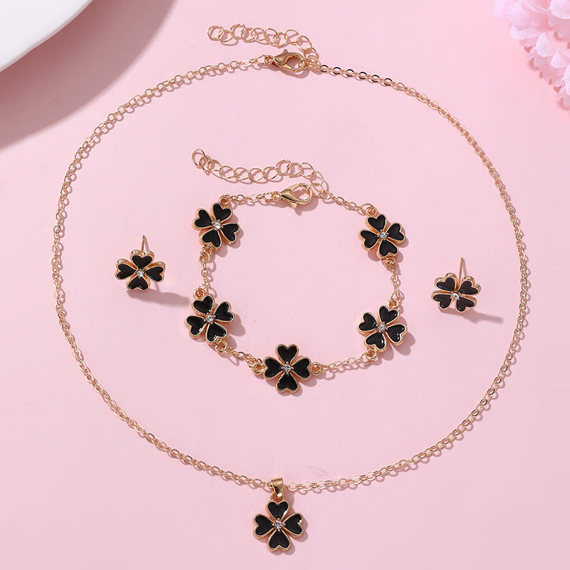 Minimalist Bowknot Resin Necklace Set for Girls with Matching Bracelet and Stud Earrings Featuring Enamel Finish
