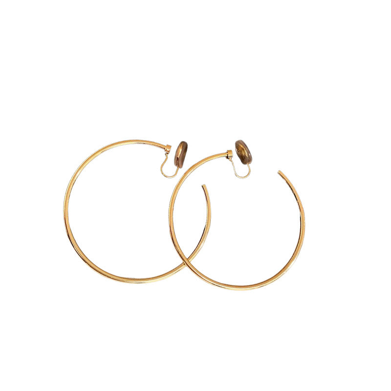 Orecchini a clip a cerchio geometrici minimalisti in rame da donna con finitura placcata, gioielli eleganti di lusso