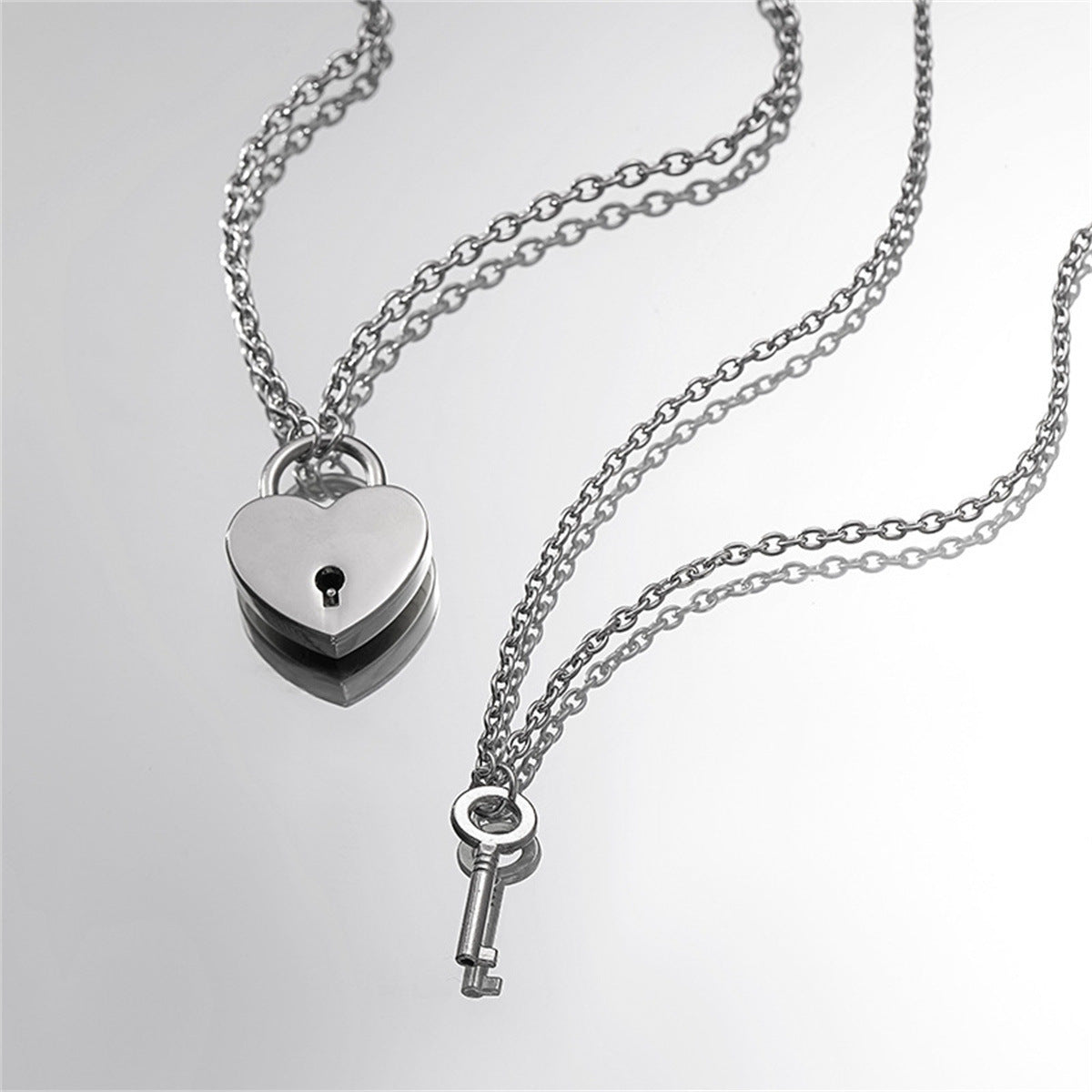 Collana con ciondolo a cuore in acciaio al titanio dolce e audace con lucchetto a chiave funzionante, gioielli unisex per coppie