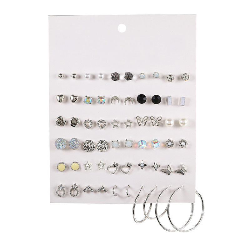 Geometric Asymmetric Micro-inlay Cubic Zirconia and Pearl Titanium Steel Earrings Set with Bow Design