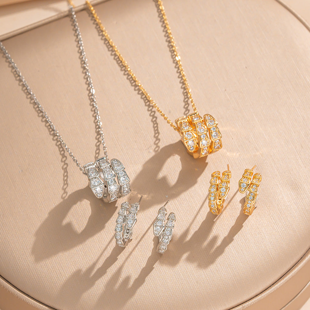 Orecchini di lusso minimalisti in rame a forma di serpente con intarsi in zircone, set di gioielli di moda regolabili per donne e uomini
