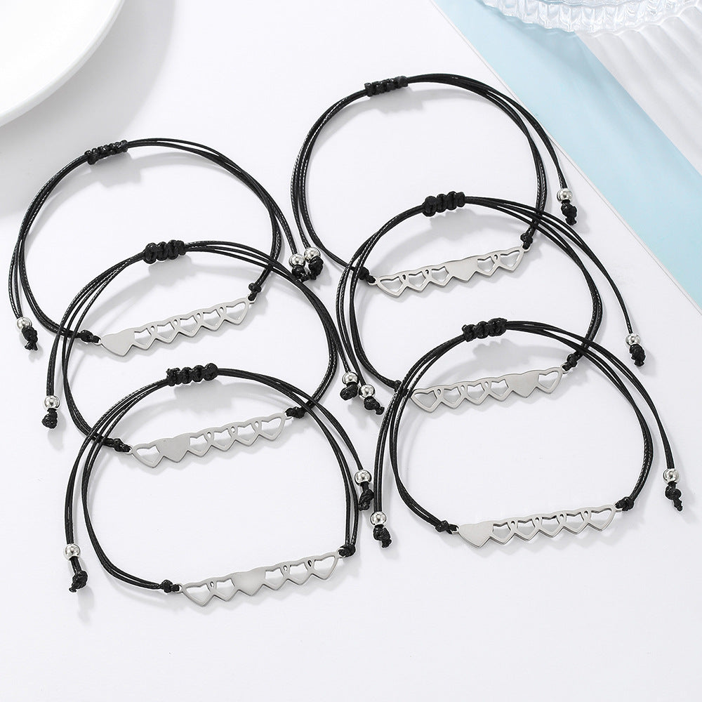 Set di bracciali con cuore vuoto minimalista in cordino cerato intrecciato in acciaio in titanio per uomo e donna