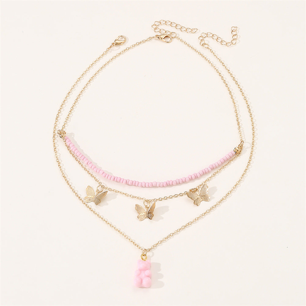 Conjunto de collar con colgante de oso lindo para niños en cuentas rosas con material de resina y estilo de cadena de placa retorcida