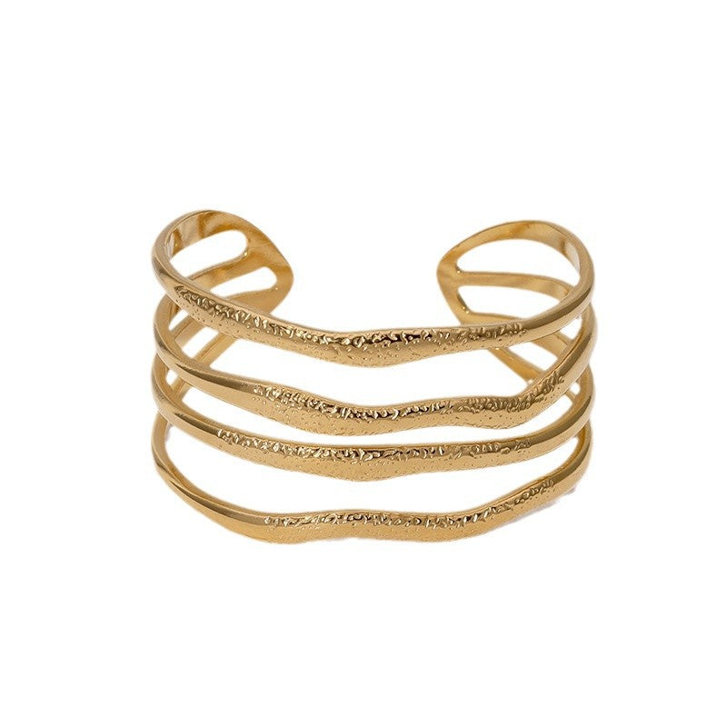 Bracciale rigido da donna in acciaio inossidabile, con design geometrico irregolare, placcato oro, stile minimalista di lusso