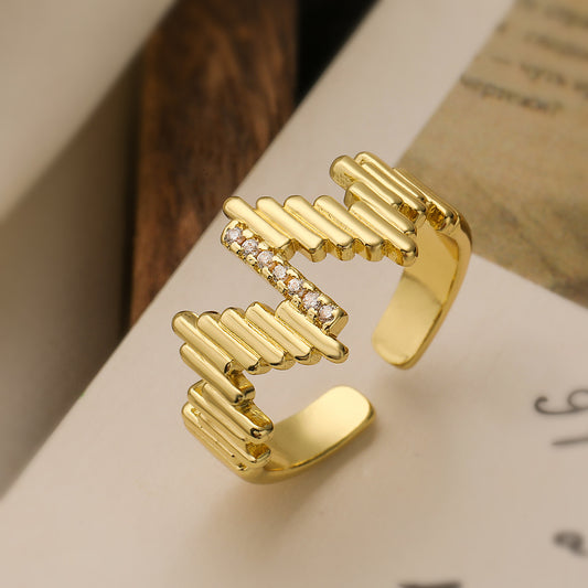 Anello da donna minimalista a onda geometrica con intarsio in zirconi e rame placcato oro
