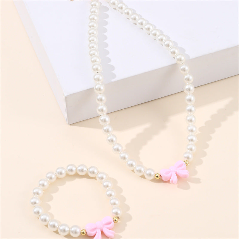 Set collana in lega a forma di fiocco stile principessa per ragazze con catena di perline rotonde e finitura artigianale