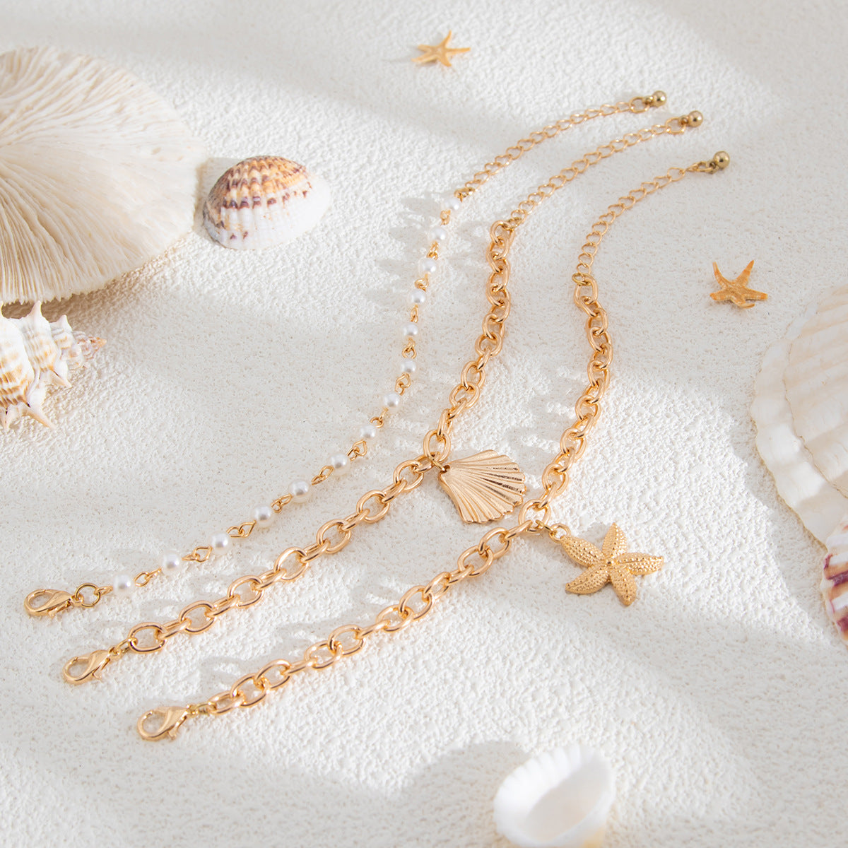 Collana con ciondolo a stella in lega di zinco impilabile con nappa e catena irregolare da donna