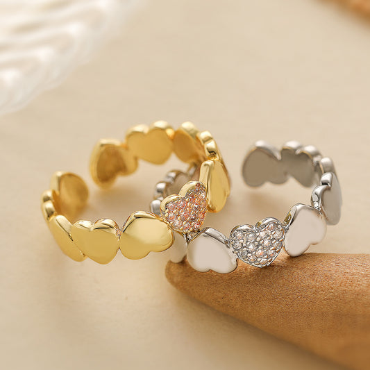 Anillo Minimalista Geométrico Corazón Abierto para Mujer en Cobre con Baño de Oro de 18K e Incrustaciones de Zirconia