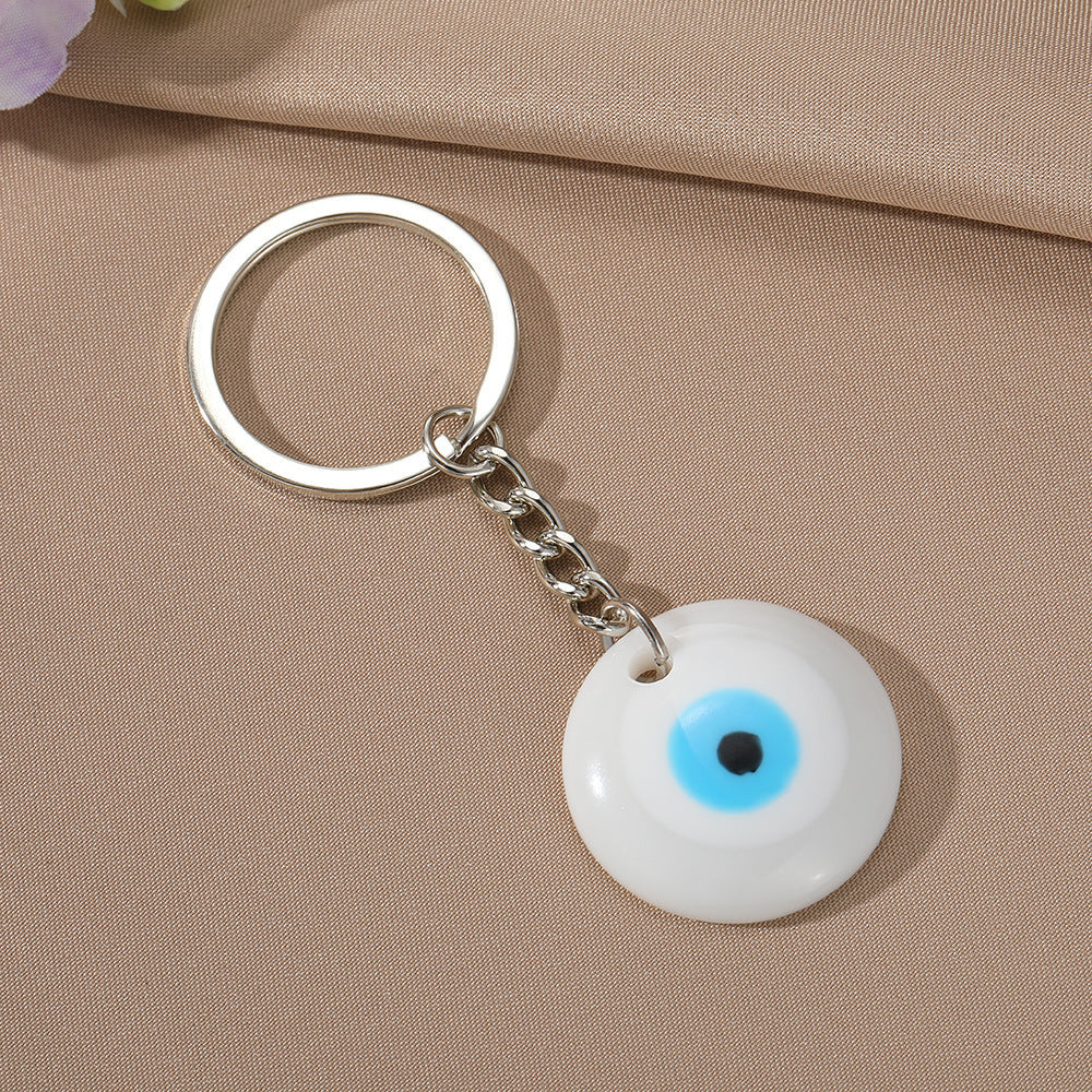 Minimalist Round Resin Evil Eye Keychain with Floral Pattern