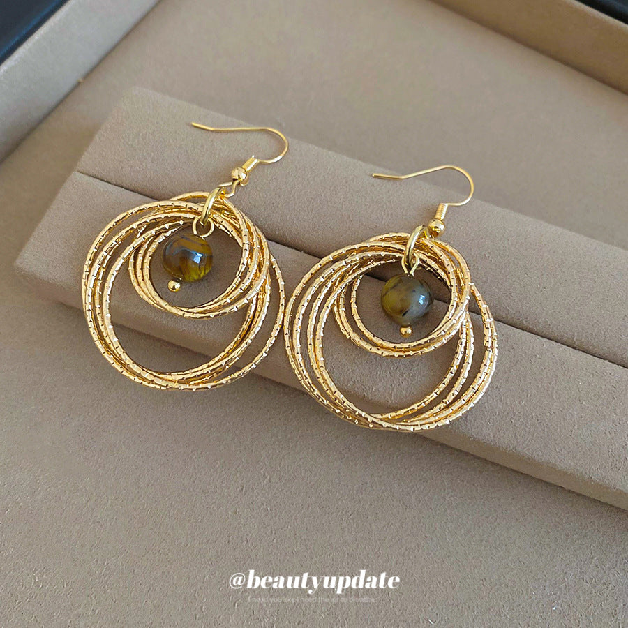 Orecchini a cerchio da donna pendenti rotondi vintage con occhio di tigre, design geometrico minimalista con base in ferro, gioielli statement leggeri di lusso